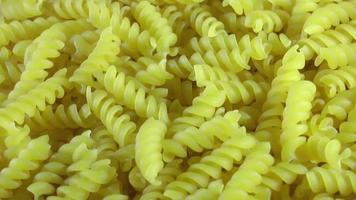 Uncooked Pastas Spinning Over A Tray video