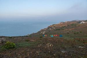 The early morning of camping Island, rocks and sunshine form a beautiful scenery photo