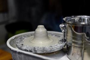 The process of making pottery in a Pottery Workshop photo