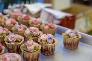 A small cake with handmade flower patterns photo