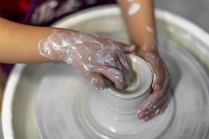 The process of making pottery in a Pottery Workshop photo