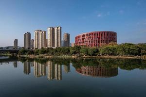 The stream reflects the Putian Museum of China in the evening photo