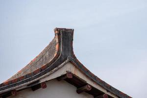 The eaves and corners of traditional Chinese residential buildings are made of red brick and lime photo