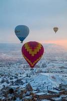Cappadocia, Turkey, 2021 - Hot air balloons flying over Cappadocia