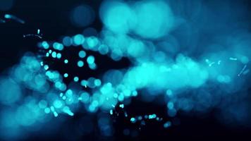 background blur bright blue digital particles wave motion on black video