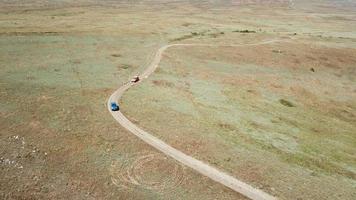 Aerial view. Cars go across the field. General's beaches, Crimea video