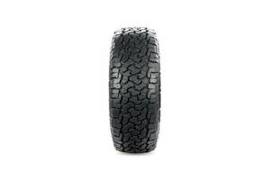 Front view of an all terrain tire isolated on white background. photo