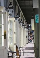 Bourbon Street at the French Quarter in New Orleans, Louisiana photo