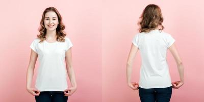 Front and back photo of  young curly woman touches t-shirt standing over pink background