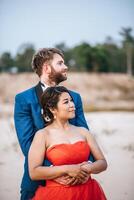 Asian bride and Caucasian groom have romance time and happy together photo