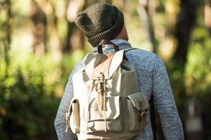Men traveller going alone in the wild photo