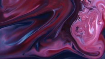 Splash de peinture de couleur abstraite isolé sur fond noir video