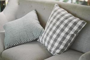 Close up detail of gray pillow on sofa in a home photo