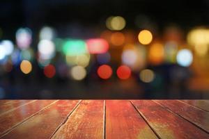 Empty wooden table in front of abstract blurred background. can be used for display or montage your products. Mock up for display of product photo