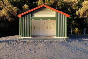 Outdoors public toilets in a park photo