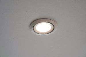 LED downlight or ceiling light Installed on a gray ceiling close up photo