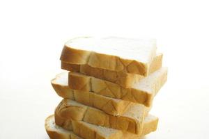 Homemade slide bread on the wooden table photo