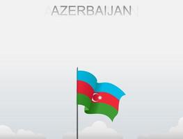 la bandera de azerbaiyán ondea en un poste que se erige alto bajo el cielo blanco vector