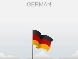 The German flag is flying on a pole that stands tall under the white sky vector