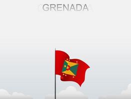 The Grenada flag is flying on a pole that stands tall under the white sky vector