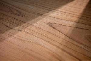 Natural patterned teak texture for a light-filled background. photo