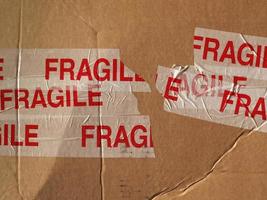 Fragile on cardboard packet photo