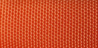 Orange fabric texture background photo