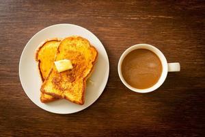 French toasted with butter and honey photo