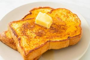 French toasted with butter and honey photo