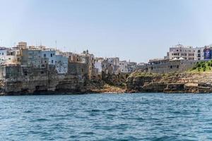 Polignano a Mare seen from the sea photo