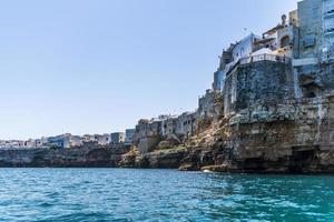 Polignano a Mare seen from the sea photo