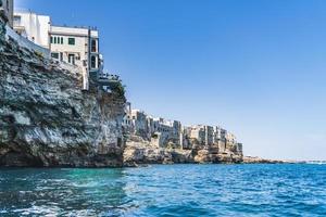 Polignano a Mare seen from the sea photo