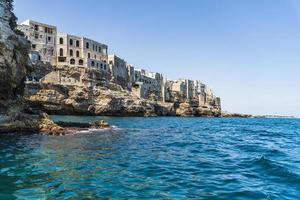 Polignano a Mare seen from the sea photo