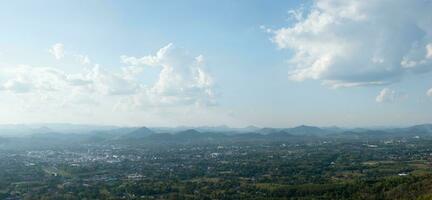 Beautiful sun sky cloud at the mountain range and the city in the background, Photo Loei  city Thailand from Phu Bo Bit mountain peak