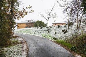 First snow on the hill towns. Between autumn and winter photo