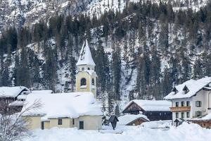 After the snowfall. Last lights of the twilight in Sappada. Magic of the Dolomites photo