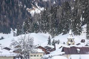 After the snowfall. Last lights of the twilight in Sappada. Magic of the Dolomites photo