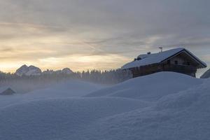 After the snowfall. Last lights of the twilight in Sappada. Magic of the Dolomites photo