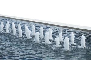 Rows Fountain spout spray in mortar basin