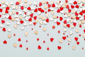 Happy Valentines day background, small hearts on pastel background photo
