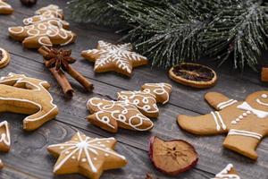 Homemade christmas gingerbread cookies on wooden table
