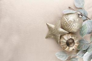 Golden christmas balls with wool background photo