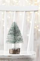 Christmas tree on bohek wooden, bokeh background photo