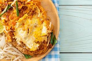 Pad Thai - stir fried noodles in Thai style with egg photo