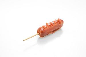 fried sausage skewer on white background photo