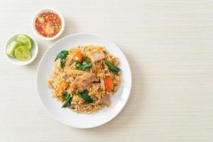 Fried rice with pork on plate photo