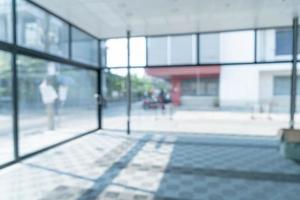 abstract blur empty office with glass window and sunlight photo