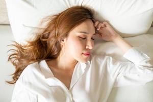 portrait beautiful woman sleeping on bed photo