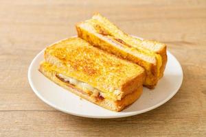 French toast ham bacon cheese sandwich photo