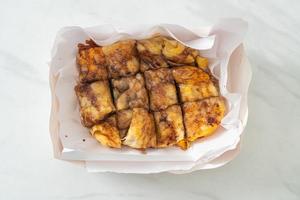 roti with egg, banana and chocolate photo